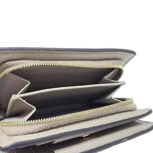 LOUIS VUITTON Portefeuille Clare Tourterelle Monogram Empreinte - 516-081825 - Picture 4 of 5